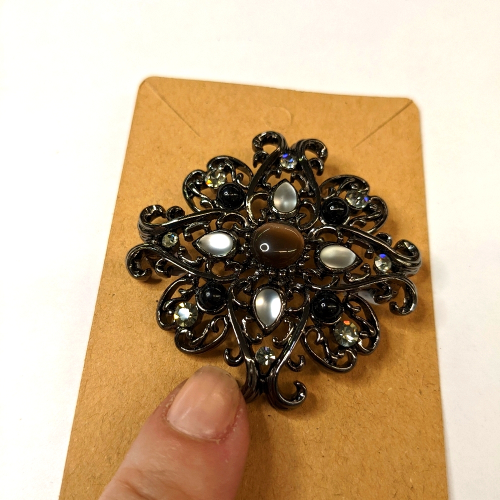 Gunmetal brooch with rhinestones & faux moonstone